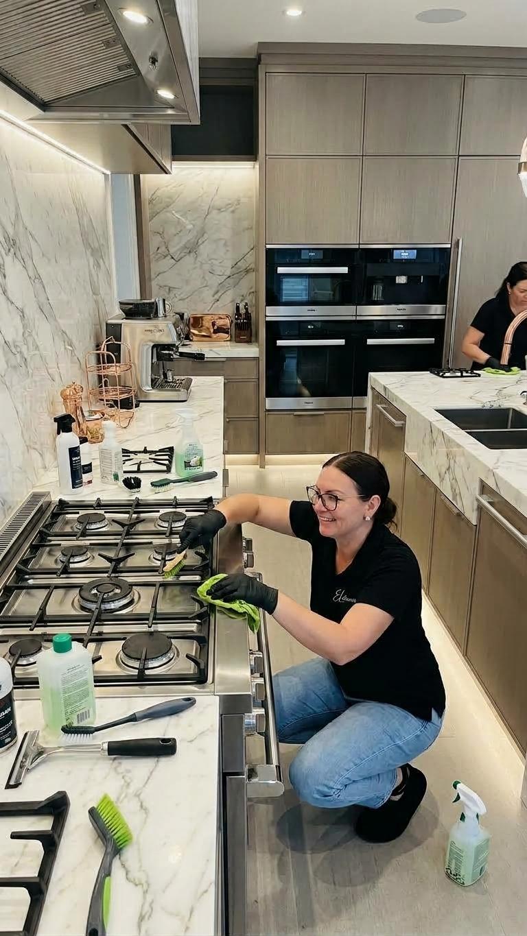 Deep Cleaning before recuring service by elcleaning team at luxury apartment in Manhattan. Huge luxury kitchen with Miele appliances being cleaned with eco supplies